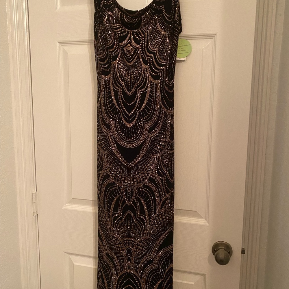 New with tag…. Black with gold design floor  length evening gown